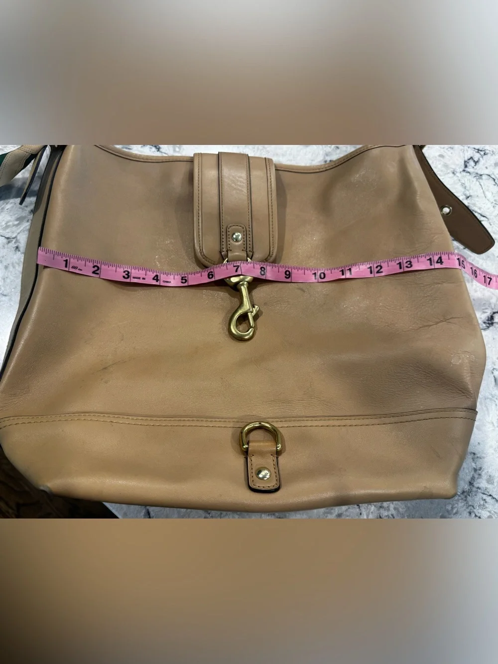 Coach tan look essentials